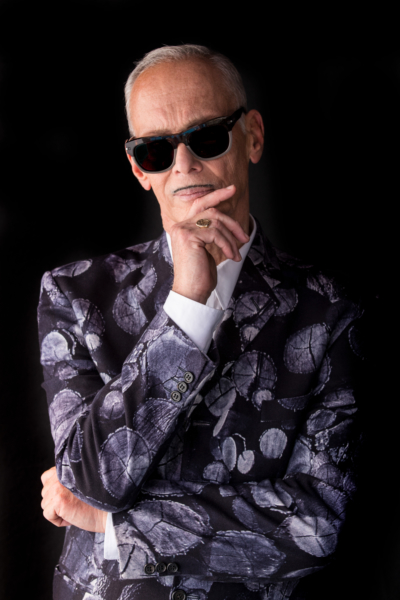 John Waters Weighs In On Lizzo, Tinder, and Santa Claus